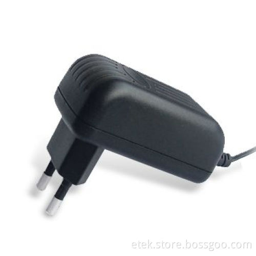 12W Series Switching Power Adapter with Europe AC Plug, Measuring 70 x 41 x 28mm